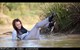 wet girl get wet wet hair swim fully clothed jacket tight jeans blouse evening gloves high heels shoes lake