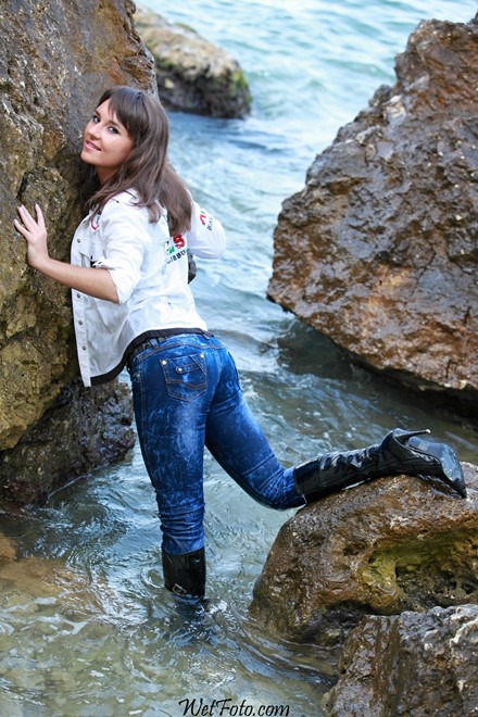 wet girl get wet wet hair swim fully clothed leather jacket jeans t-shirt patent leather high heels boots sea