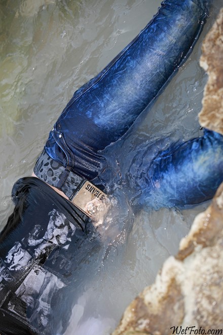 wet girl get wet wet hair swim fully clothed leather jacket jeans t-shirt patent leather high heels boots sea