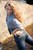 wet girl get wet wet hair swim fully clothed tight jeans shirt high heels sea