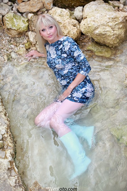 wet girl get wet wet hair dress tights leather boots sea