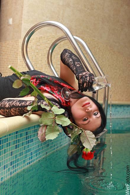 brunette wet woman wet hair get wet fully clothed dress stockings evening gloves leather high heels boots jacuzzi