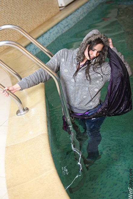 wet girl get wet wet hair swim fully clothed tight jeans jacket scarf gloves hat sneakers pool
