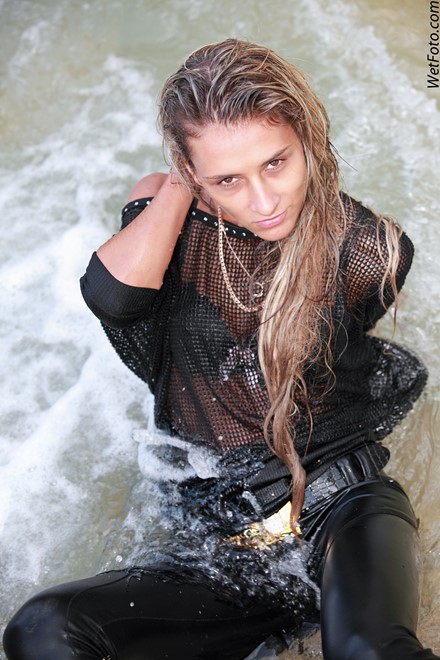 wet girl get wet wet hair leggings blouse high heels boots