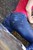 wet girl get wet wet hair swim fully clothed seater tight jeans t-shirt sneakers sea