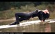 brunette wet girl wet hair get wet fully clothed corset leggings leather mantle high heels boots lake