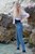 wet girl get wet wet hair fully clothed tight jeans shirt t-shirt high heels sea
