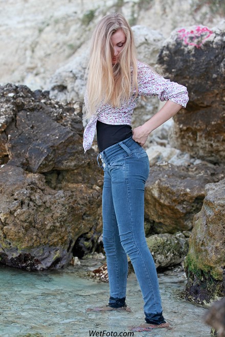 wet girl get wet wet hair fully clothed tight jeans shirt t-shirt high heels sea