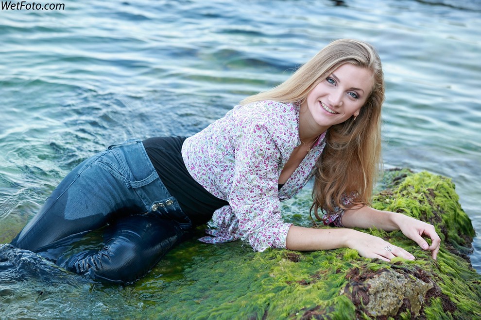 wet girl get wet wet hair fully clothed tight jeans shirt t-shirt high heels sea