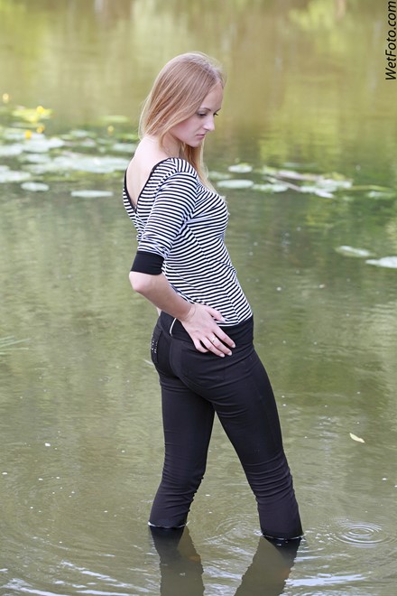 wet girl get wet wet hair fully clothed leggings tights blouse high heels lake