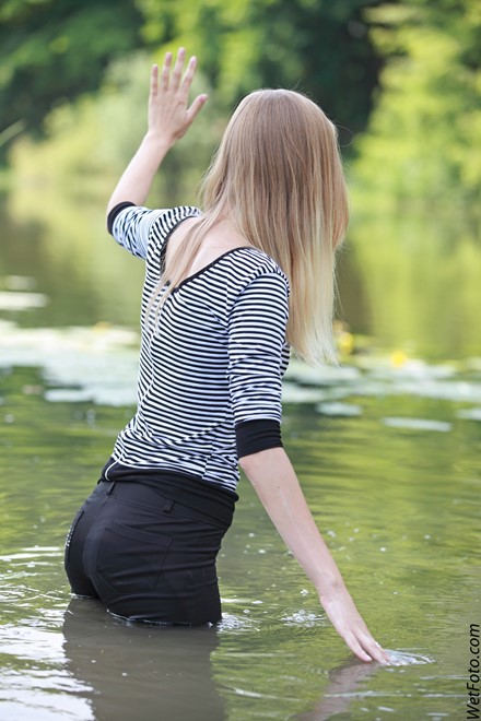 wet girl get wet wet hair fully clothed leggings tights blouse high heels lake