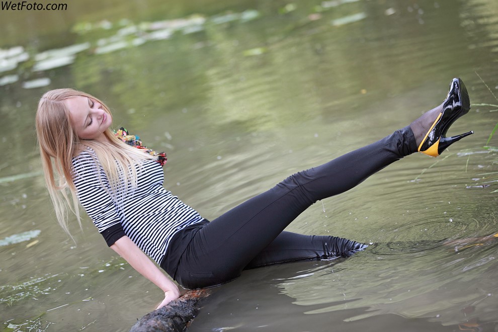 wet girl get wet wet hair fully clothed leggings tights blouse high heels lake