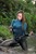 wet girl get wet wet hair blouse jeans stockings high heels sandals mud laky