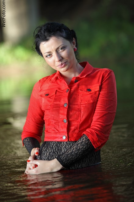wet girl get wet swim fully clothed wet hair jacket blouse tight pants tights high heels lake