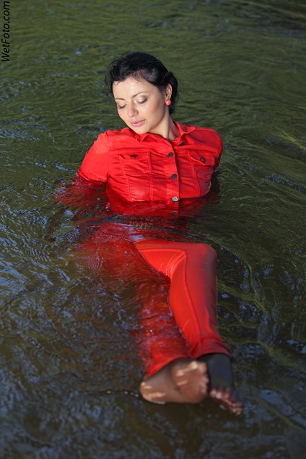 wet girl get wet swim fully clothed wet hair jacket blouse tight pants tights high heels lake