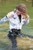 wet girl get wet wet hair soaking wet jacket golf leather pants high heels lake
