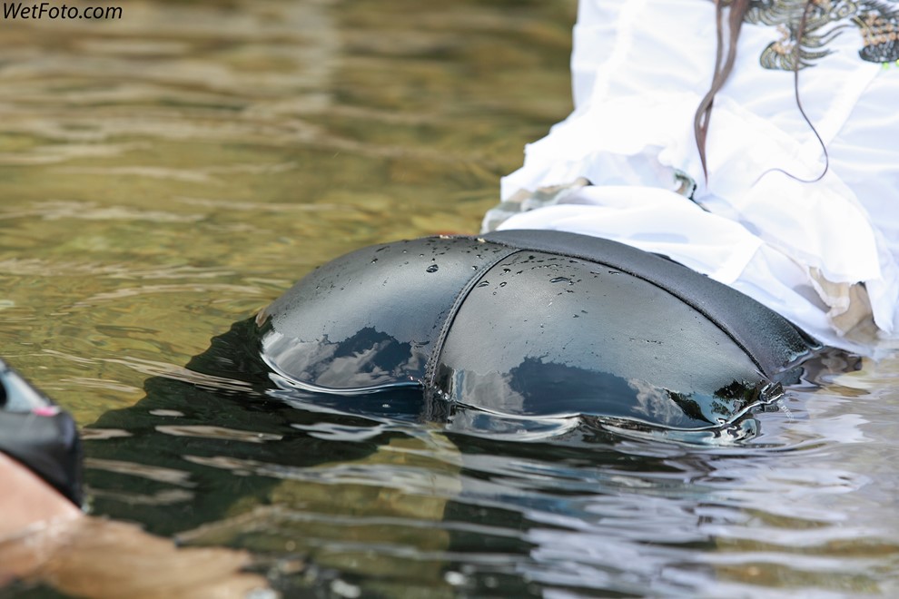 wet girl get wet wet hair soaking wet jacket golf leather pants high heels lake