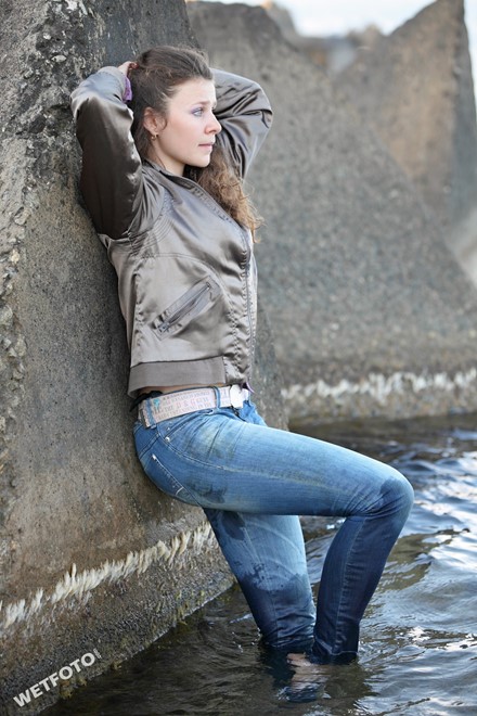 wet girl get wet swim fully clothed wet hair jacket shirt jeans sea