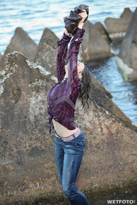 wet girl get wet swim fully clothed wet hair jacket shirt jeans sea