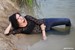 wet girl get wet fully clothed jeans blouse shoes high heels lake
