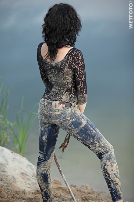 wet girl get wet fully clothed jeans blouse shoes high heels lake