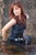 wet girl get wet wet hair fully clothed denim jumpsuit sneakers sea