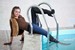 wet girl get wet wet hair swim fully clothed fur vest bodysuit jeans blouse gloves boots heels jacuzzi