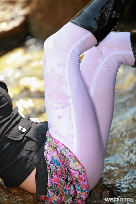 wet girl get wet fully clothed jacket leggings skirt leather boots heels sea