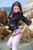 wet girl get wet fully clothed jacket leggings skirt leather boots heels sea