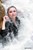 wet girl get wet fully clothed jacket leggings skirt leather boots heels sea