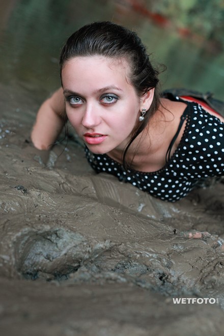wet girl get wet fully clothed fully clothed jeans blouse skirt leggings evening gloves shoes mud