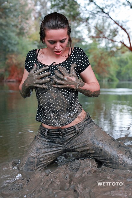 wet girl get wet fully clothed fully clothed jeans blouse skirt leggings evening gloves shoes mud