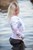 wet woman get wet fully clothed blouse leggings shoes sea
