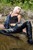 wet girl get wet wet hair fully clothed jacket denim jeans boots lake
