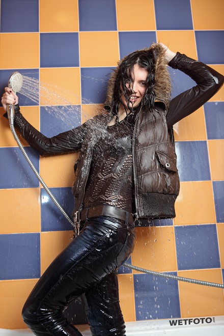 wet woman get wet wet hair fully clothed jacket sweater jeans boots bath