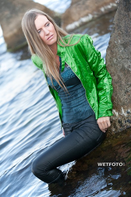 wet girl get wet jacket jeans blouse hat shoes sea
