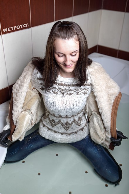 wet girl get wet wet hair fully clothed jacket sweater jeans high heels boots jacuzzi