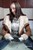 wet girl get wet wet hair fully clothed jacket sweater jeans high heels boots jacuzzi