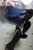 wet girl get wet wet hair fully clothed jacket sweater jeans high heels boots jacuzzi