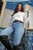 wet woman get wet wet hair jeans shirt boots leather high heels pool