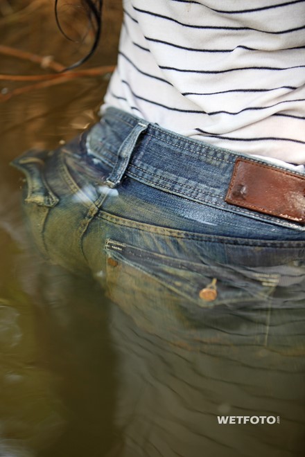 wet girl brunette wet hair get wet swimming fully clothed tight jeans sweater tights shoes high heels river