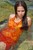 wet girl brunette wet hair get wet swimming fully clothed orange dress sea