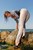 wet girl brunette wet hair get wet soaked swimming fully clothed white jeans blouse heels clothes sea
