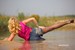 wet girl get wet blouse denim shorts tights high heels swim fully clothed lake