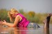 wet girl get wet blouse denim shorts tights high heels swim fully clothed lake