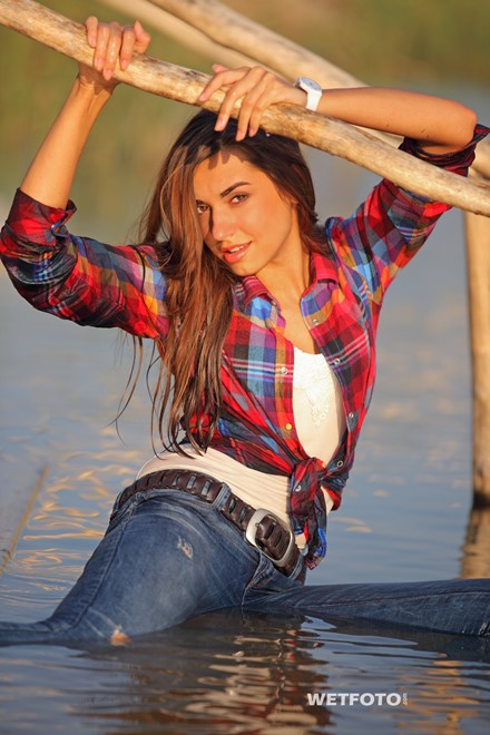 wet girl get wet wet hair swim fully clothed jeans shirt sneakers lake