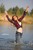 wet girl get wet wet hair swim fully clothed jeans shirt sneakers lake