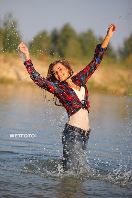 wet girl get wet wet hair swim fully clothed jeans shirt sneakers lake