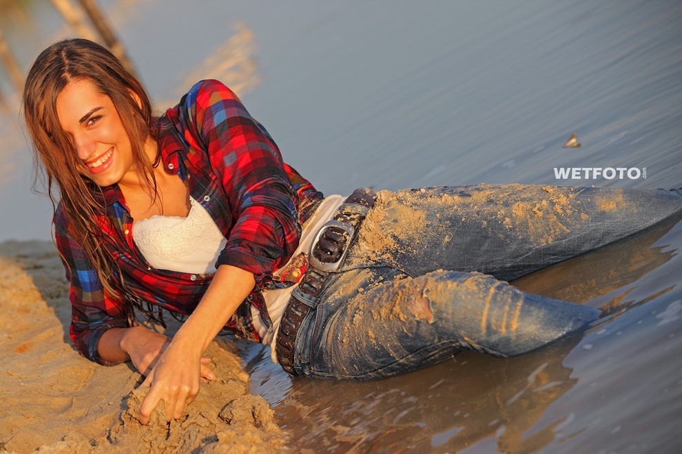 wet girl get wet wet hair swim fully clothed jeans shirt sneakers lake