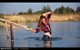 wet girl get wet wet hair swim fully clothed jeans shirt sneakers lake